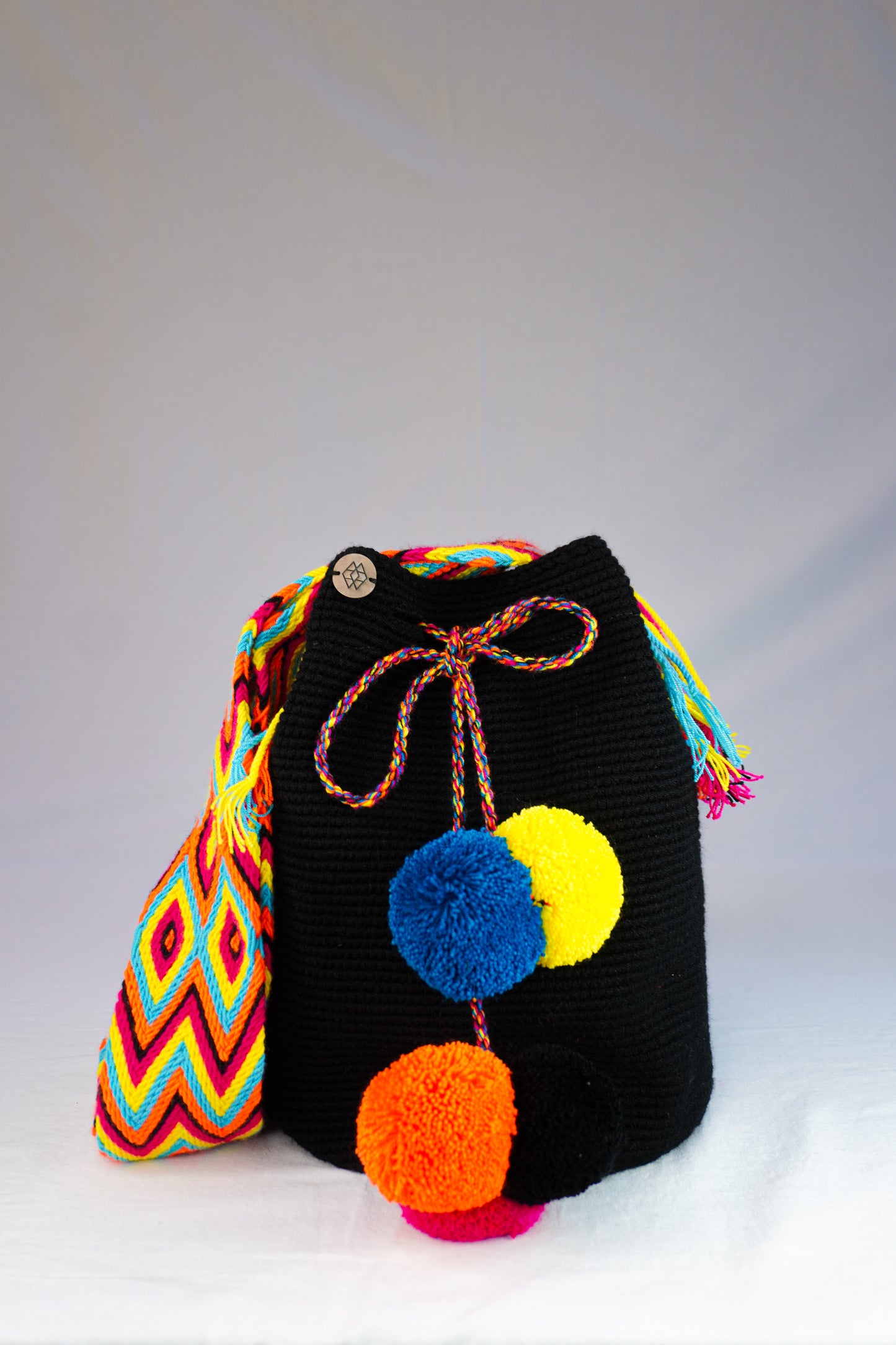 Mochila Cinco Borlas